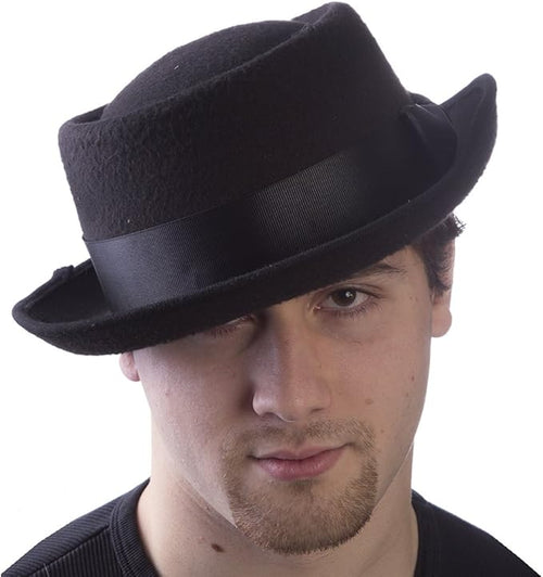 Man wearing a black fedora hat on a white background