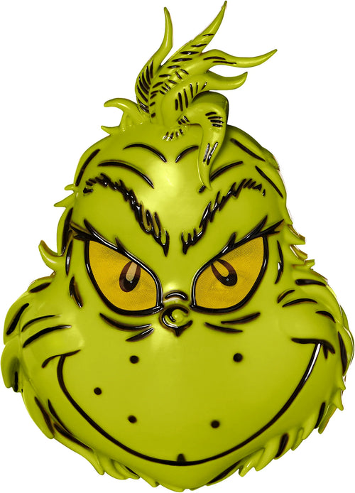 Green character with yellow eyes and black accents on a white background