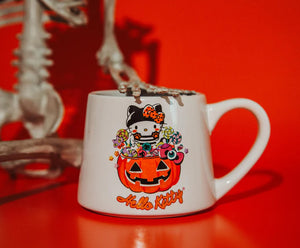 SANRIO HELLO KITTY PUMPKIN CANDY BURGLAR TAPERED POTTERY MUG | HOLDS 14 OUNCES