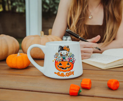 SANRIO HELLO KITTY PUMPKIN CANDY BURGLAR TAPERED POTTERY MUG | HOLDS 14 OUNCES