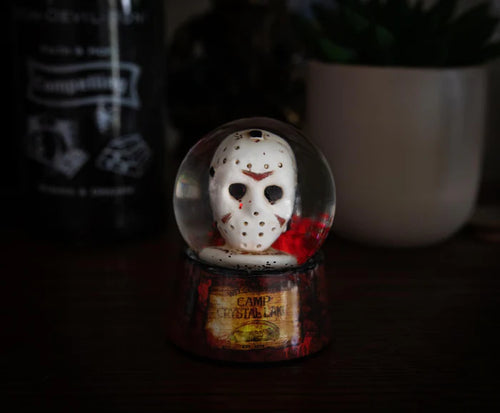 THANK GOODNESS IT'S FRIDAY  There is no place to hide when Jason Voorhees is on your trail. Now the masked slasher with an affinity for machetes can always keep a close eye on you. Evil rises again with this collectible mini snow globe that recalls the disturbing events that happen on Friday the 13th. The miniature hockey mask that sits inside the globe is painted with hardened wear and tear.  YOU'RE NOT EVEN SAFE IN SPACE