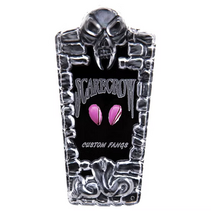 A tombstone-shaped custom fan sign featuring a skull at the top, the word 'SCARECROW' in stylized lettering, two pink eyes, and 'CUSTOM FANGS' at the bottom, shown on a plain white background.
