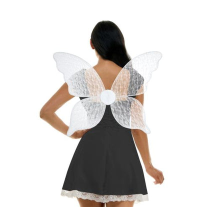 Person wearing butterfly wings with a white background
