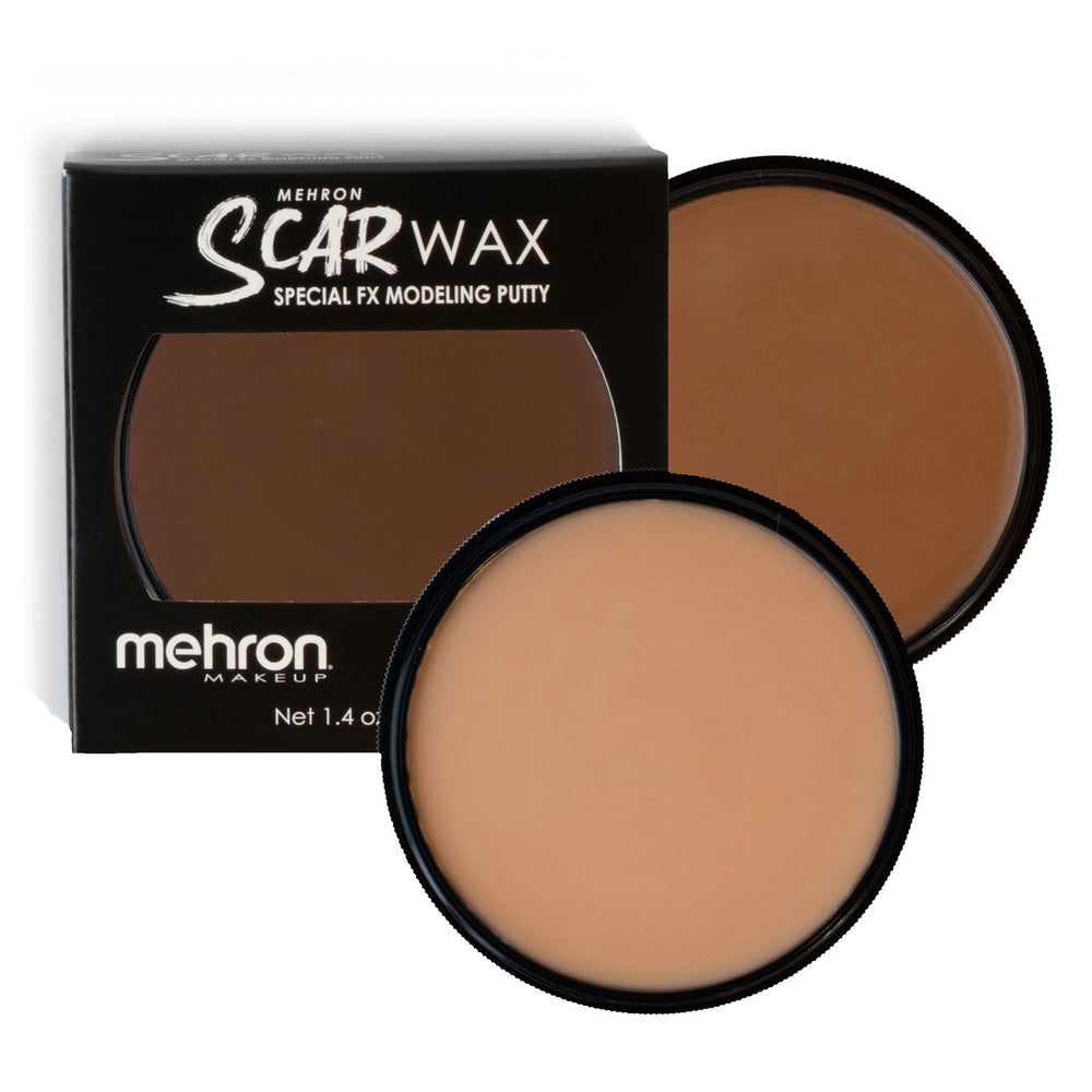 How to use:  Scar Wax is easy to work with and can be molded and shaped with your fingertips. If desired, a spatula can be used to create cuts in the wax and help with smoothing. For long-wear and extra durability tap Spirit Gum onto the skin before wax application. Scar Wax can be colored using cream or water-activated paints to match your skin tone or create bruise FX. Remove with soap & water.