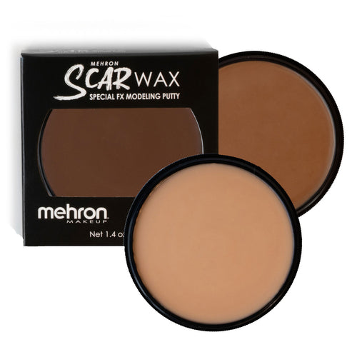 How to use:  Scar Wax is easy to work with and can be molded and shaped with your fingertips. If desired, a spatula can be used to create cuts in the wax and help with smoothing. For long-wear and extra durability tap Spirit Gum onto the skin before wax application. Scar Wax can be colored using cream or water-activated paints to match your skin tone or create bruise FX. Remove with soap & water.