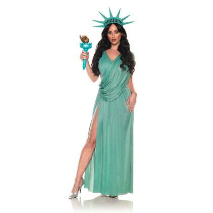 Person wearing a green costume with a headpiece and holding a torch on a white background