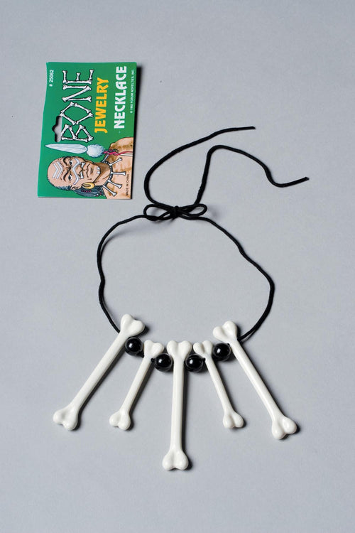Black beads, white bones tie necklace