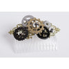 Clear hair comb with gold, silver and black gears