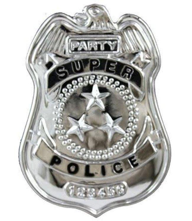 Silver police officer badge