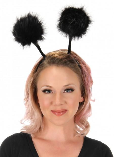 Black headband and pompoms